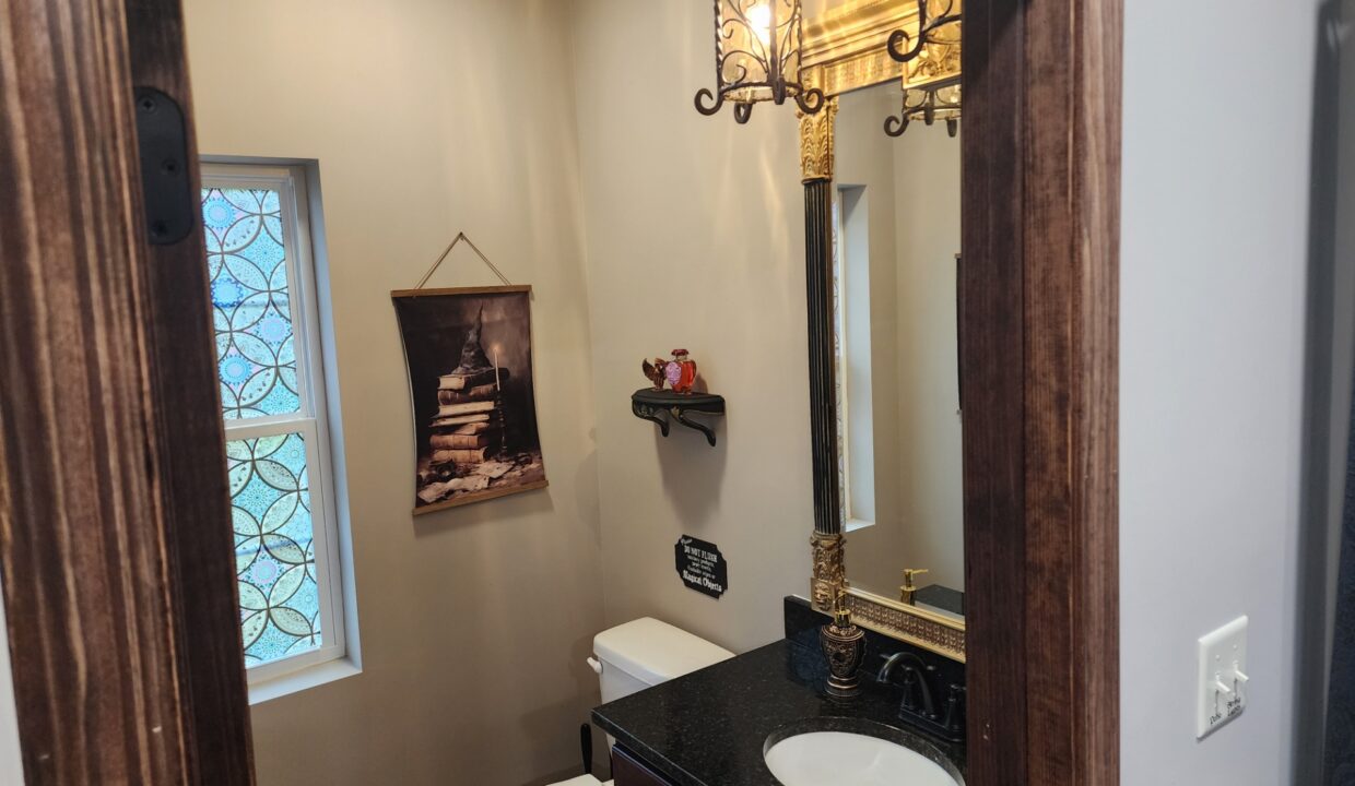 Half Bathroom at Three Wizards - Vacation rental in The Forgotten Forest in Kodak (Sevier County) Tennessee. Airbnb VRBO Book Direct