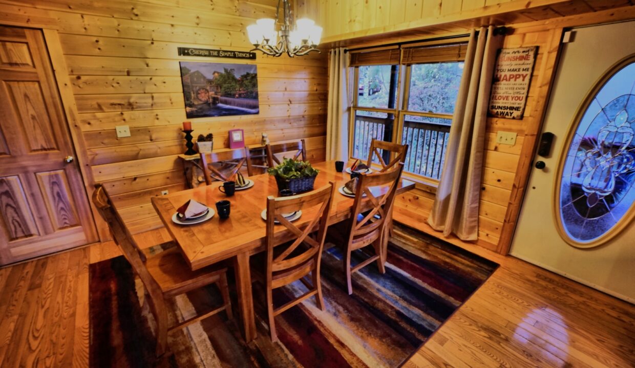 Dining Table at Hoedown Hideaway  Pigeon Forge cabin Airbnb VRBO Book Direct