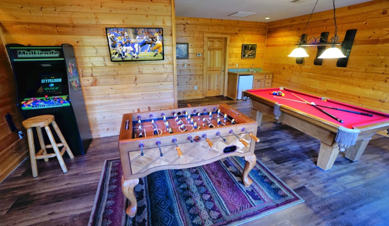 Game Room at Hoedown Hideaway Pigeon Forge cabin Airbnb VRBO book direct