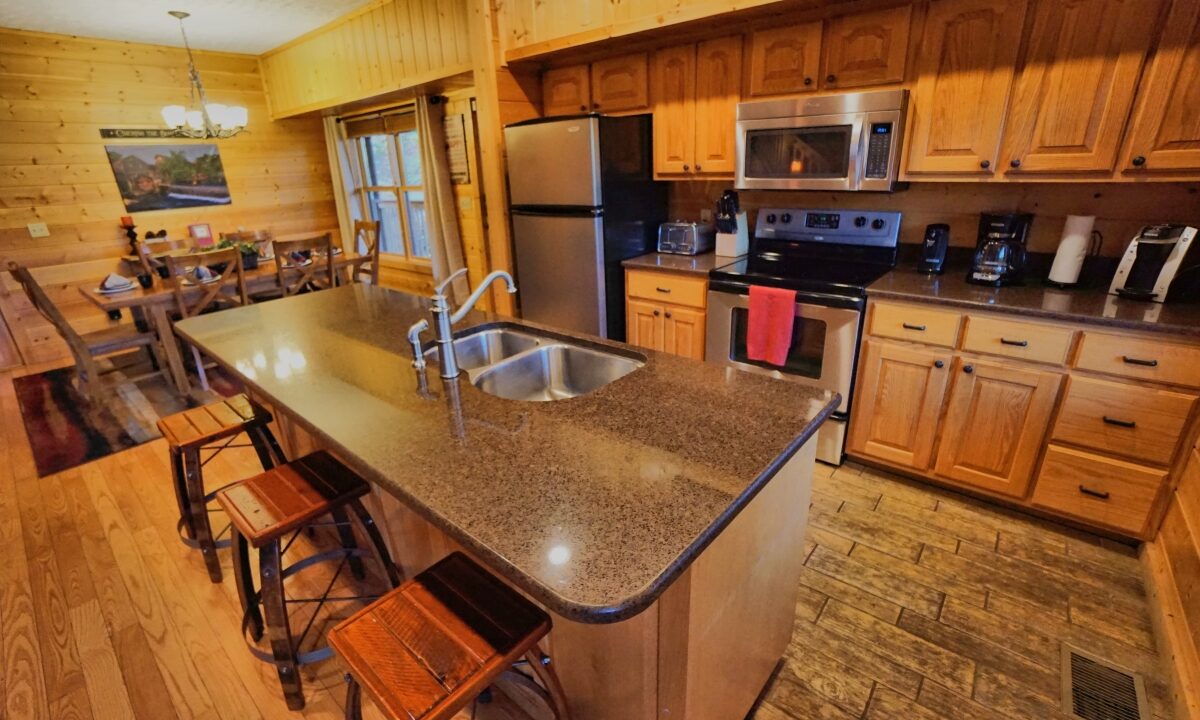 Kitchen at Hoedown Hideaway  Pigeon Forge cabin Airbnb VRBO Book Direct